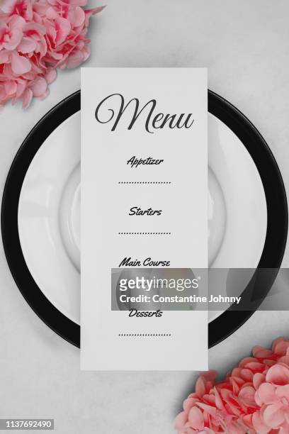 place setting and menu on dine table - wedding menu fotografías e imágenes de stock
