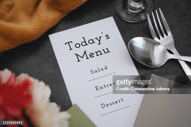 place setting and menu on dine table - menu stock pictures, royalty-free photos & images