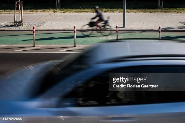 Cyclist is pictured on a separated bike line on April 17, 2019 in Berlin, Germany.
