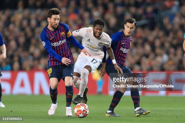 Fred of Man Utd battles with Lionel Messi of Barcelona and Philippe Coutinho of Barcelona during the UEFA Champions League Quarter Final second leg...