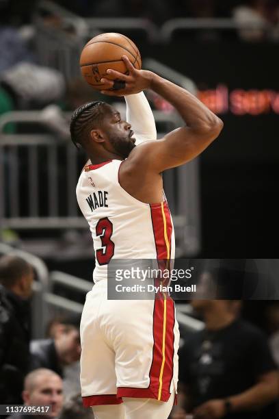 Dwyane Wade of the Miami Heat attempts a shot in the first quarter against the Milwaukee Bucks at the Fiserv Forum on March 22, 2019 in Milwaukee,...