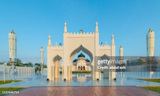 morning at baiturrahman grand mosque, aceh, indonesia - banda aceh stock pictures, royalty-free photos & images