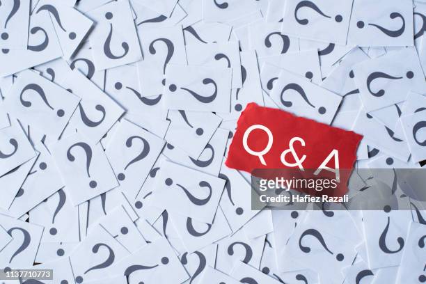 full frame shot of adhesive notes on table - q and a stock pictures, royalty-free photos & images