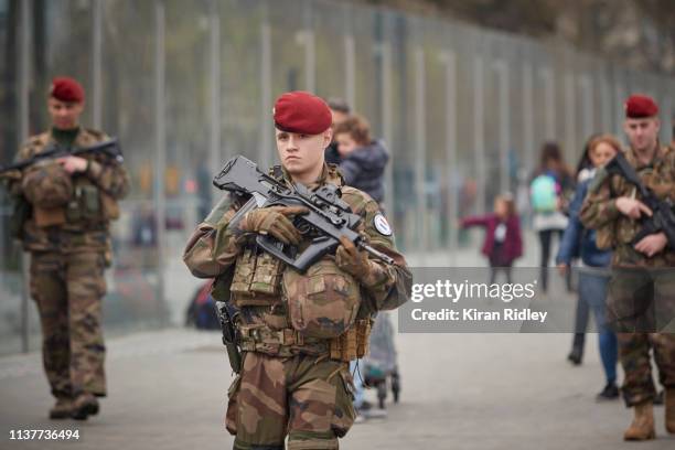 French Army soldiers of Operation Sentinelle patrol around the Eiffel Tower during Act 19 of Gilets Jaunes or ‘Yellow Vest’ protests on March 23,...