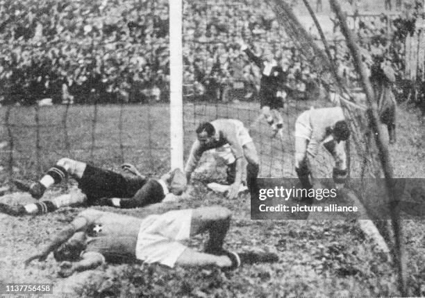 Austria's goalkeeper Peter Platzer lying defeated on the ground, after Italy's Enrico Guaita scored the 0:1 during the World Cup semifinal against...