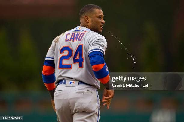 Robinson Cano of the New York Mets spits after lining out to end the top of the sixth inning against the Philadelphia Phillies at Citizens Bank Park...