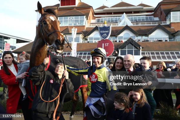 Noel Fehily poses with family after winning his last race before retirement at Newbury Racecourse on March 23, 2019 in Newbury, England.