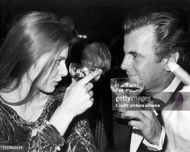 Swiss-Austrian actor Maximilian Schell and German actress Nastassja Kinski look in each other's eyes during the German Film Ball on 19 January 1980...