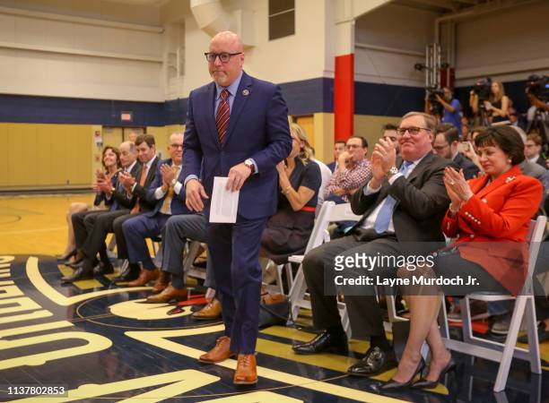 David Griffin, Executive Vice President of Basketball Operations for the New Orleans Pelicans, walks to the podium during an introductory press...