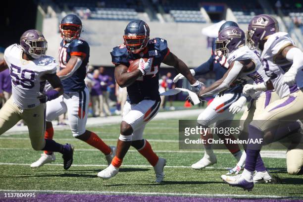 De'Veon Smith of the Orlando Apollos rushes for a 1-yard touchdown during the second quarter against the Atlanta Legends in an Alliance of American...