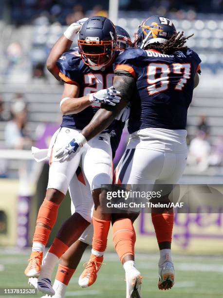 Cody Riggs celebrates with Izaah Burks Sr. #97 of the Orlando Apollos during the second half against the Atlanta Legends in an Alliance of American...