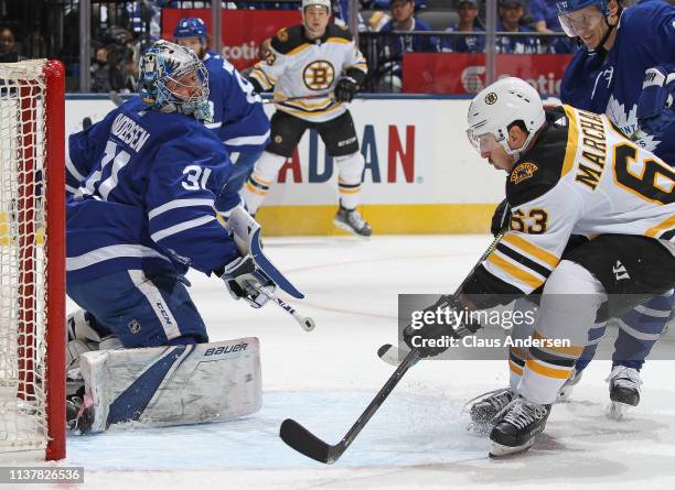 Brad Marchand of the Boston Bruins scores against Frederik Andersen of the Toronto Maple Leafs in Game Four of the Eastern Conference First Round...