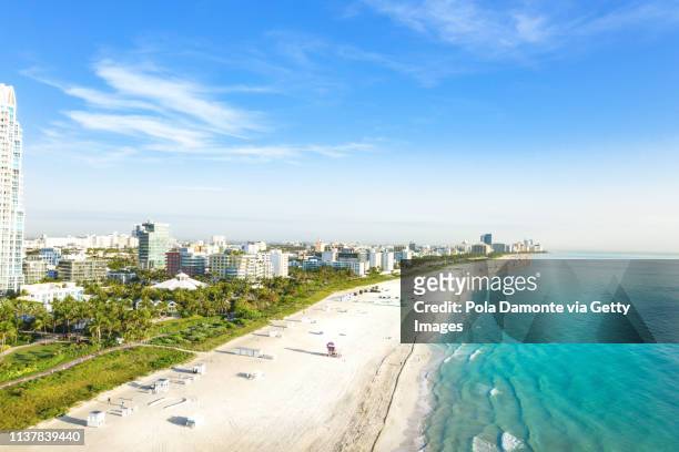 high view of south beach in miami from south pointe park, florida, usa - miami beach south pointe park foto e immagini stock
