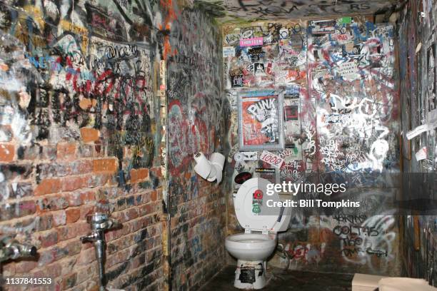 July 1983]: The Men's bathroom inside the club CBGB. July 1983 in New York City.