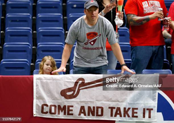 Fans for the San Antonio Commanders hold a banner before the Alliance of American Football game between the Salt Lake Stallions and the San Antonio...