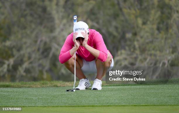 Carlota Ciganda of Spain lines up after hitting her birdie putt on the 18th hole during the third round of the Bank Of Hope Founders Cup at the...