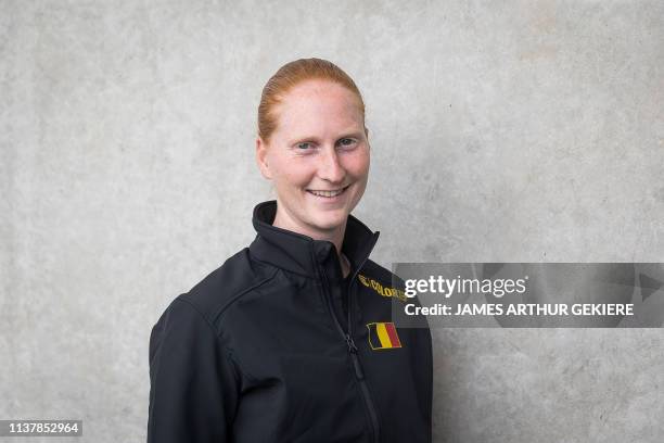 Belgian Alison Van Uytvanck poses for the photographer at a press conference regarding the Fed Cup World Group play-offs tennis between Belgium and...