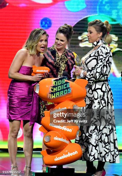 Candace Cameron Bure, Andrea Barber Jodie Sweetin accept the Favorite Funny TV Show award for 'Fuller House' onstage at Nickelodeon's 2019 Kids'...