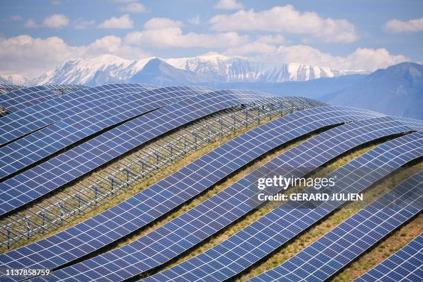 General view shows the photovoltaic solar pannels at the power plant in La Colle des Mees, Alpes de Haute Provence, southeastern France, on April 17,...