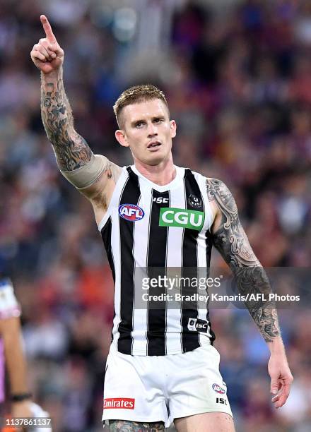 Dayne Beams of the Magpies celebrates kicking a goal during the round 5 AFL match between Brisbane and Collingwood at The Gabba on April 18, 2019 in...