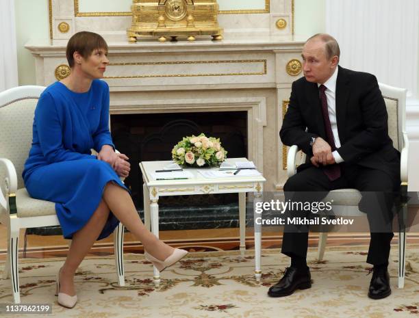 Russian President Vladimir Putin listens to Estonian President Kersti Kaljulaid during their bilateral meeting at the Kremlin on April 18, 2019 in...