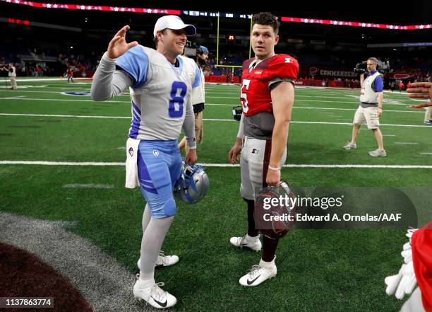 Quarterbacks Austin Allen of Salt Lake Stallions and Logan Woodside QB of San Antonio Commanders meet on the field after the Commanders defeated the...