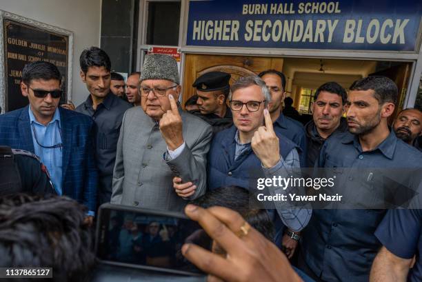 Farooq Abdullah, patron and president of the pro-India National Conference party along with his son Omar Abdullah, former Chief Minister of Jammu and...