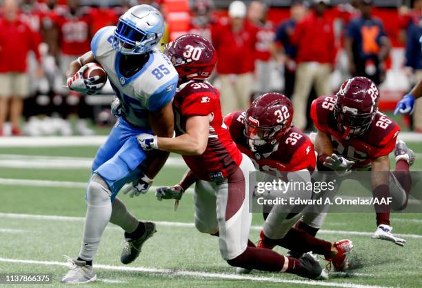 Chase Dutra of San Antonio Commanders tackles Nick Truesdell of Salt Lake Stallions during the fourth quarter of the Alliance of American Football...