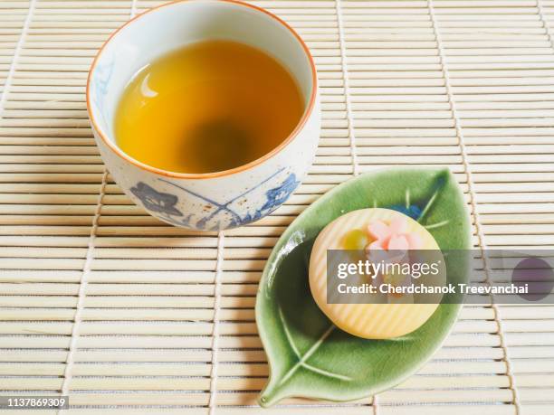 hot green tea with red bean mochi - green bean tea stock pictures, royalty-free photos & images