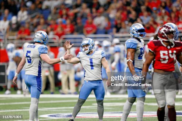 Taylor Bertolet is of the Salt Lake Stallions is congratulated by Austin Rahkow after his field goal at Alamodome on March 23, 2019 in San Antonio,...