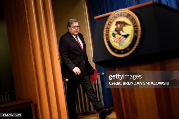 Attorney General William Barr arrives for a press conference about the release of the Mueller Report at the Department of Justice April 18 in...