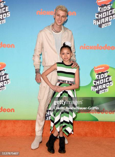 Machine Gun Kelly and Casie Colson Baker attend Nickelodeon's 2019 Kids' Choice Awards at Galen Center on March 23, 2019 in Los Angeles, California.