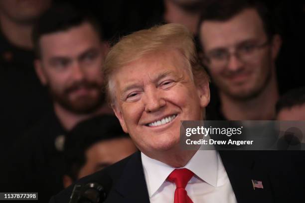 President Donald Trump smiles during an event recognizing the Wounded Warrior Project Soldier Ride in the East Room of the White House, April 18,...