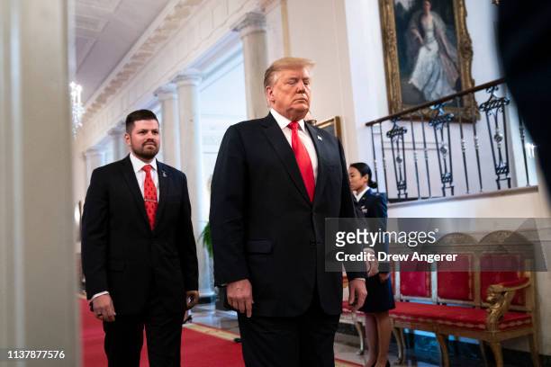 President Donald Trump arrives for an event recognizing the Wounded Warrior Project Soldier Ride in the East Room of the White House, April 18, 2019...