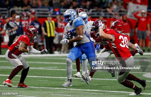 Nick Truesdell of the Salt Lake Stallions looks for room between San Antonio Commanders defenders at Alamodome on March 23, 2019 in San Antonio,...