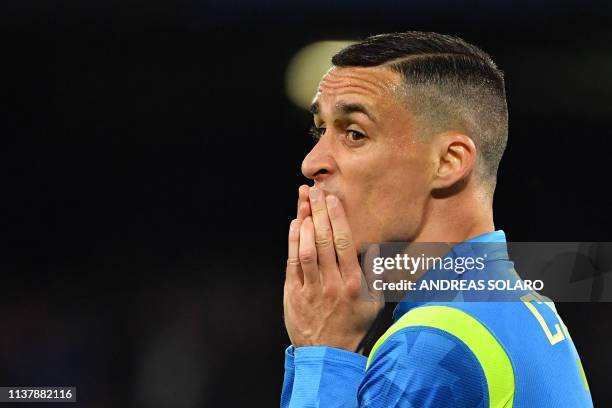 Napoli's Spanish forward Jose Callejon reacts after missing a goal opportunity during the UEFA Europa League quarter-final second leg football match...
