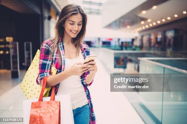 beautiful woman in the shopping mall - girl after shopping stock pictures, royalty-free photos & images