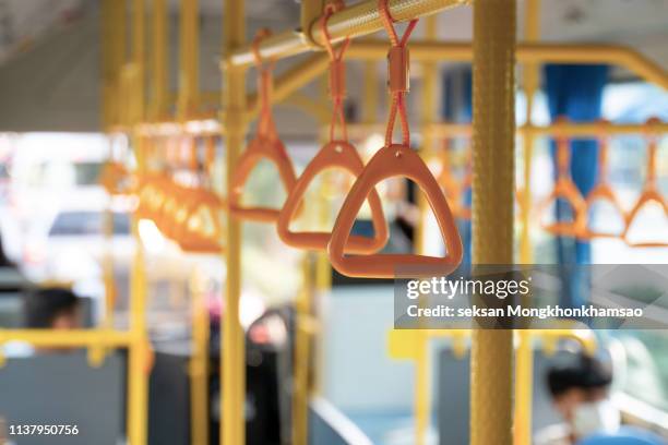 handle in the public transport - passenger train stockfoto's en -beelden