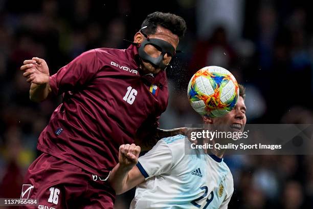Roberto Rosales of Venezuela is challenged by juan Marcos Foyth of Argentina during the international friendly match between Argentina and Venezuela...