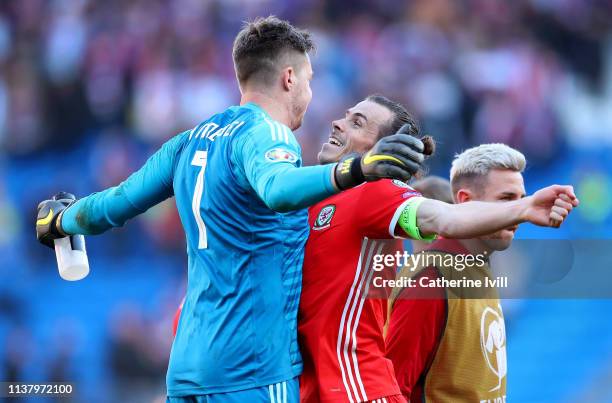 Wayne Hennessey of Wales celebrates with Gareth Bale of Wales after their team win the 2020 UEFA European Championships group E qualifying match...