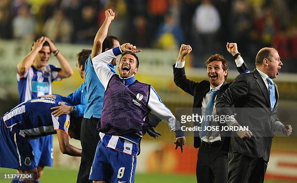 Porto's coach Andre Villas Boas celebrates with teammates after the UEFA Europa League semi-final second leg football match between Villarreal and...