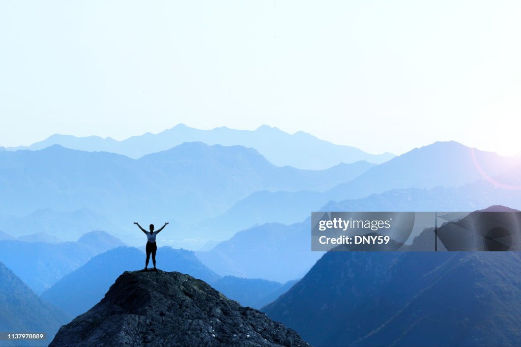 Female Hiker Celebrating Success