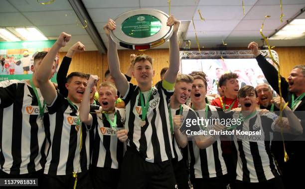 The team of SV Sandhausen 1916 cdelebrates with the trophy after winning the German Futsal Championship of B Juniors at Sporthalle West on March 24,...