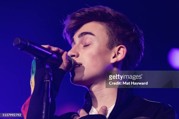 Singer-songwriter Johnny Orlando performs on stage during WE Day at Tacoma Dome on April 18, 2019 in Tacoma, Washington.
