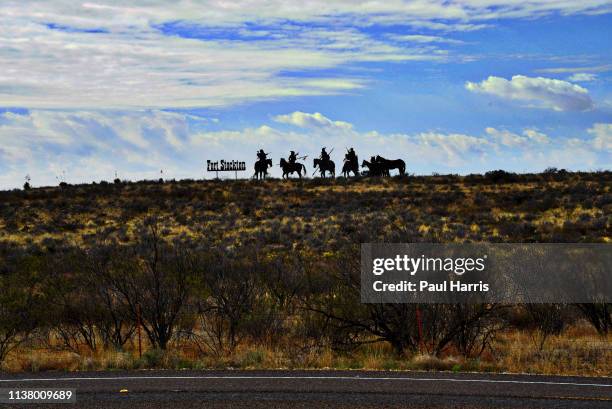 Look to the East is the name of a silhouette sculpture representing a small hunting party of Comanche Indians by Brian Norwood located west of Fort...