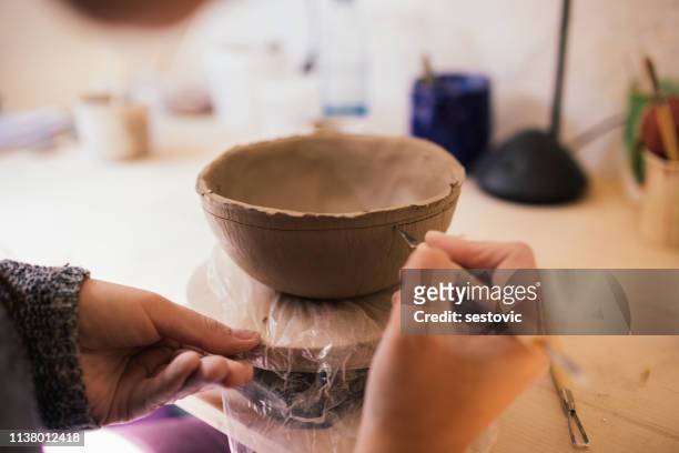 potter at work - moulding a shape stock pictures, royalty-free photos & images