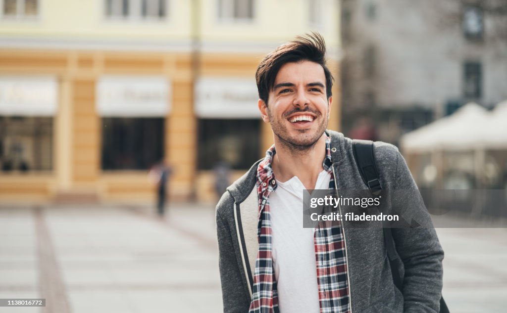 Portrait Of Smiling Young Man High-Res Stock Photo - Getty Images