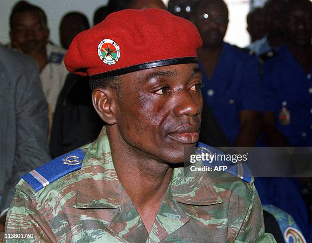 Member of Burkina Faso's presidential guard Marcel Kafando attends his trial 17 August 2000, at the military tribunal in Ouagadoudou. Kafando and two...