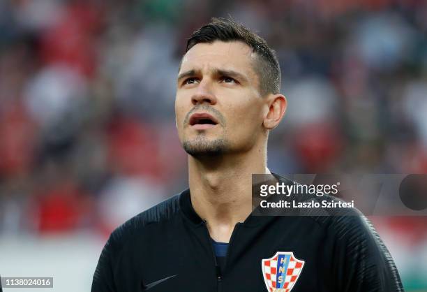 Dejan Lovren of Croatia listens to the anthem prior to the 2020 UEFA European Championships group E qualifying match between Hungary and Croatia at...