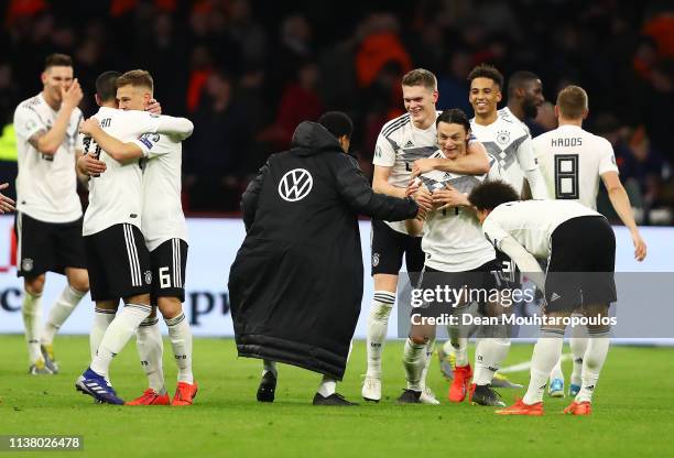 Winning goalscorer Nico Schulz of Germany celebrates victory with team mates after the 2020 UEFA European Championships Group C qualifying match...